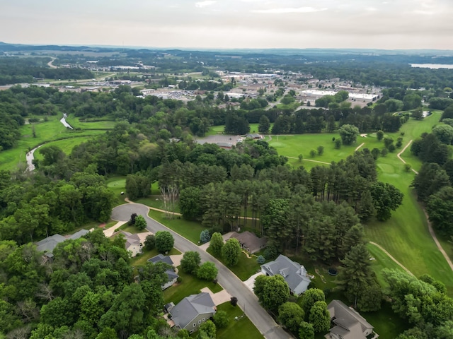 1403 Elm Ave W, Menomonie, WI 54751 - aerial view of property and surrounding area with a tree filled landscape