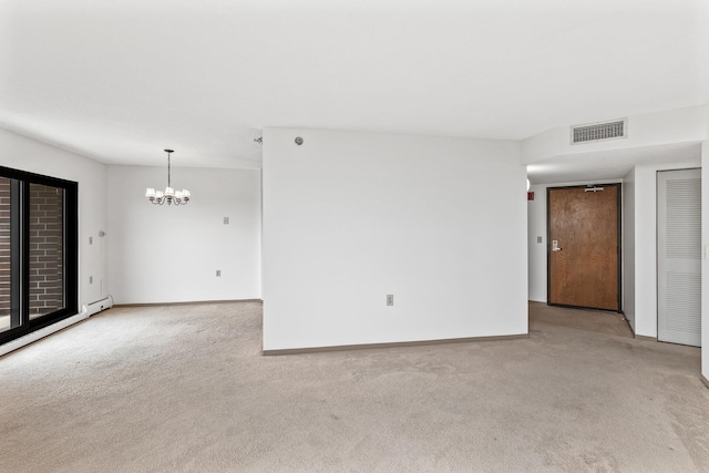 6615 Lake Shore Dr S Unit 900, Richfield, MN 55423 - unfurnished room with light colored carpet, a chandelier, and baseboard heating