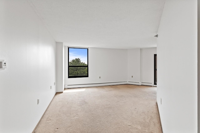 6615 Lake Shore Dr S Unit 900, Richfield, MN 55423 - spare room featuring carpet floors and a baseboard heating unit