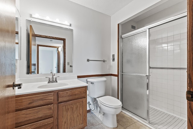 6615 Lake Shore Dr S Unit 900, Richfield, MN 55423 - bathroom with a stall shower, vanity, and tile patterned flooring