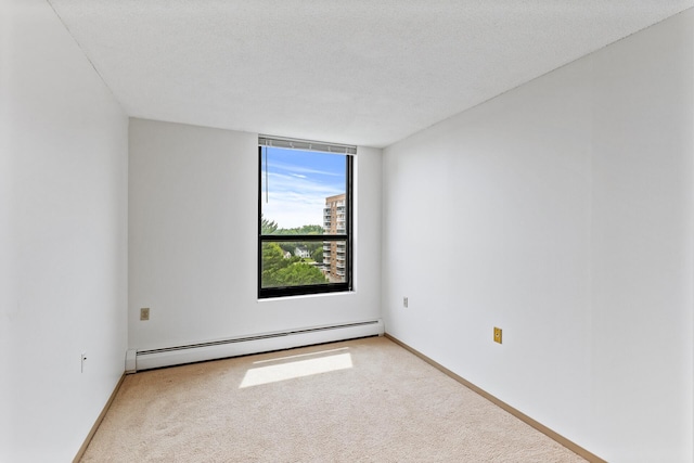 6615 Lake Shore Dr S Unit 900, Richfield, MN 55423 - empty room featuring a baseboard radiator and light colored carpet