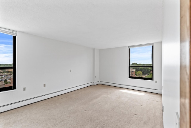 6615 Lake Shore Dr S Unit 900, Richfield, MN 55423 - carpeted spare room featuring a baseboard radiator