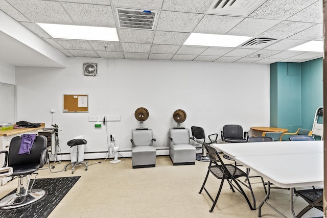 6615 Lake Shore Dr S Unit 900, Richfield, MN 55423 - miscellaneous room with tile patterned floors, a baseboard heating unit, and a drop ceiling