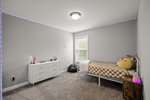 1771 Emerson Ct, Chaska, MN 55318 - carpeted bedroom with baseboards and a textured ceiling