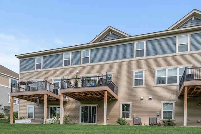 1771 Emerson Ct, Chaska, MN 55318 - back of house featuring a lawn