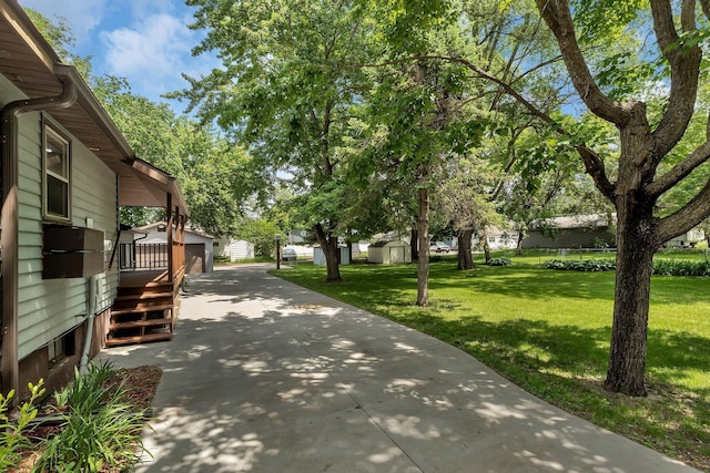 920 2nd Ave S, Sauk Rapids, MN 56379 - view of community with a yard and an outbuilding