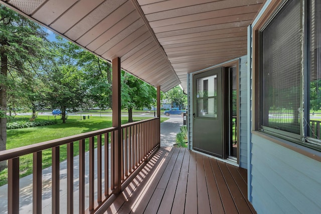 920 2nd Ave S, Sauk Rapids, MN 56379 - wooden porch featuring a lawn