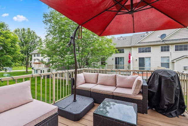 3123 Legacy Ln, Woodbury, MN 55129 - wooden deck with outdoor lounge area, a lawn, and a grill