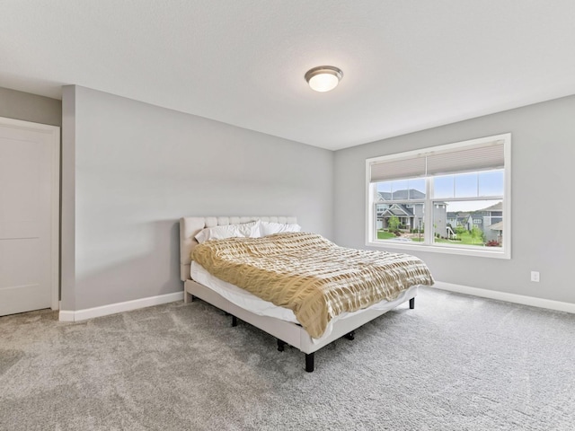 7154 Alphabet St, Chanhassen, MN 55317 - bedroom featuring baseboards and carpet