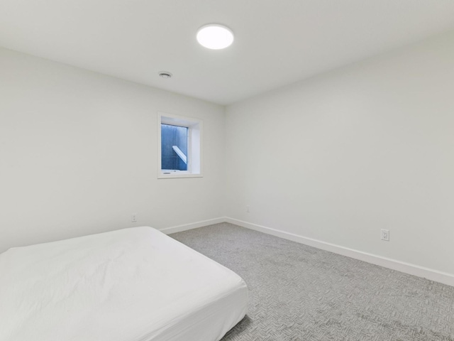 7154 Alphabet St, Chanhassen, MN 55317 - unfurnished bedroom with baseboards and carpet flooring