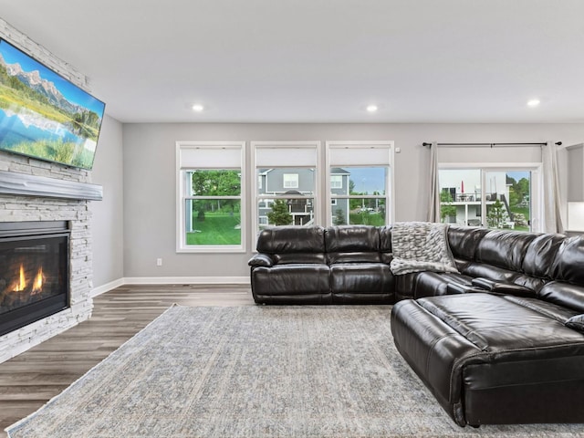 7154 Alphabet St, Chanhassen, MN 55317 - living area featuring wood finished floors, a fireplace, and recessed lighting