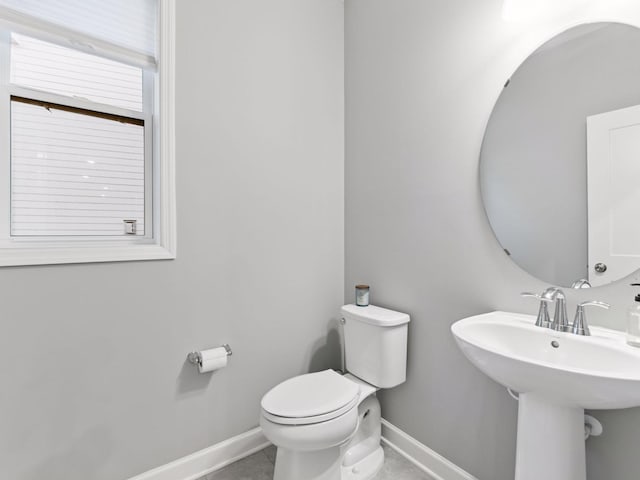 7154 Alphabet St, Chanhassen, MN 55317 - half bathroom with baseboards and toilet