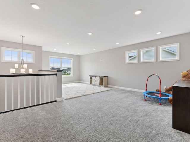 7154 Alphabet St, Chanhassen, MN 55317 - game room featuring carpet flooring, a chandelier, and recessed lighting
