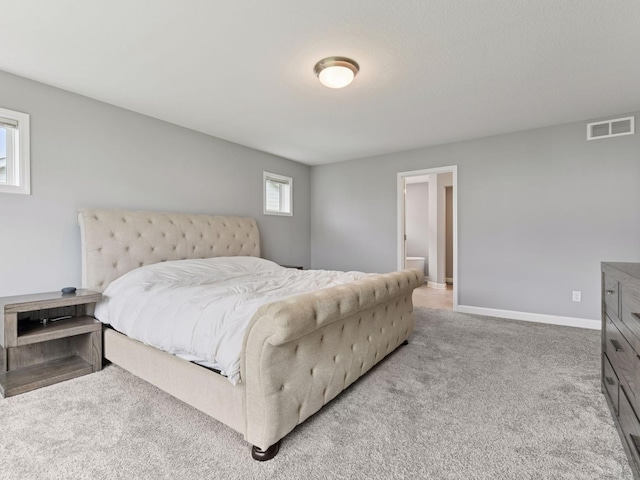 7154 Alphabet St, Chanhassen, MN 55317 - carpeted bedroom featuring baseboards and ensuite bathroom