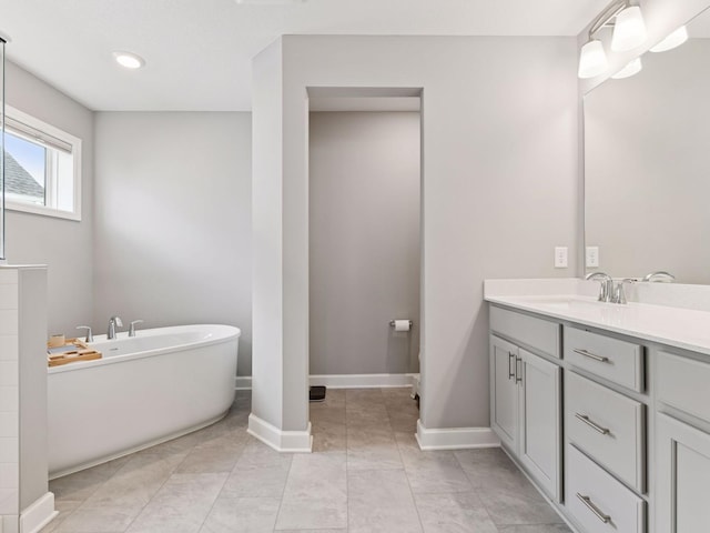 7154 Alphabet St, Chanhassen, MN 55317 - full bathroom with a freestanding tub and vanity