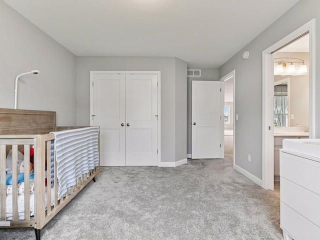 7154 Alphabet St, Chanhassen, MN 55317 - bedroom featuring carpet floors, a closet, and ensuite bathroom