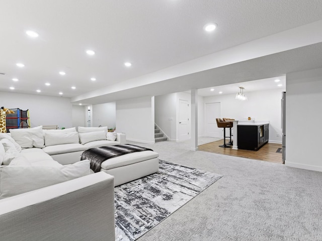 7154 Alphabet St, Chanhassen, MN 55317 - living room featuring light colored carpet, bar, recessed lighting, and stairs