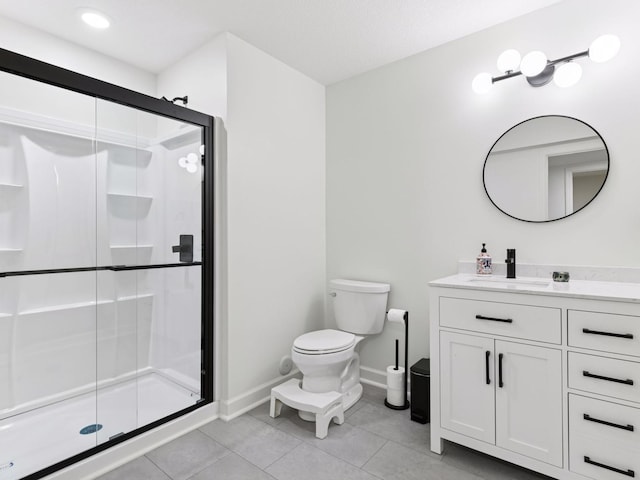 7154 Alphabet St, Chanhassen, MN 55317 - bathroom featuring vanity, a stall shower, and tile patterned floors
