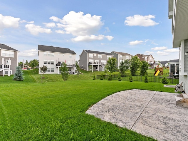 7154 Alphabet St, Chanhassen, MN 55317 - view of yard featuring a residential view, a patio, and a playground