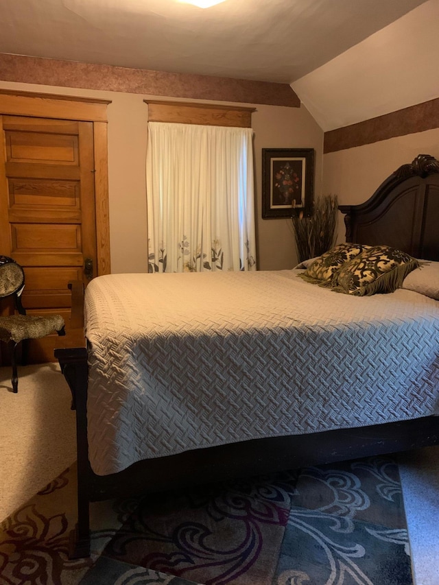 821 3rd Ave, Madison, MN 56256 - bedroom featuring carpet floors and lofted ceiling