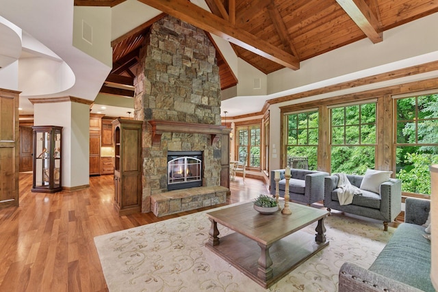 1904 Linner Rd, Minnetonka, MN 55391 - living room with light wood-style floors, a wooden ceiling with exposed beams, a fireplace, and high vaulted ceiling