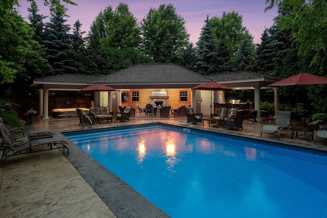 1904 Linner Rd, Minnetonka, MN 55391 - outdoor pool featuring an exterior structure, an outdoor hangout area, an outbuilding, and a patio area