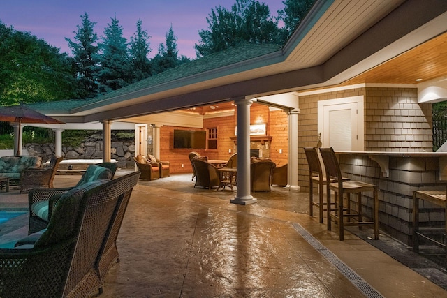 1904 Linner Rd, Minnetonka, MN 55391 - patio terrace at dusk featuring an outdoor hangout area and a patio area