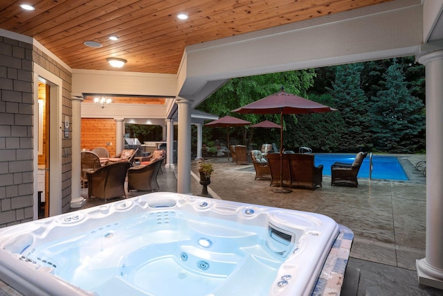 1904 Linner Rd, Minnetonka, MN 55391 - view of patio featuring a hot tub, outdoor dining area, and an outdoor pool