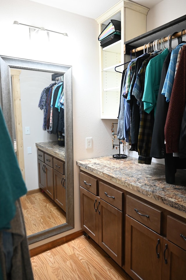 11764 35th Ave SE, Becker, MN 55308 - walk in closet featuring light wood-style flooring