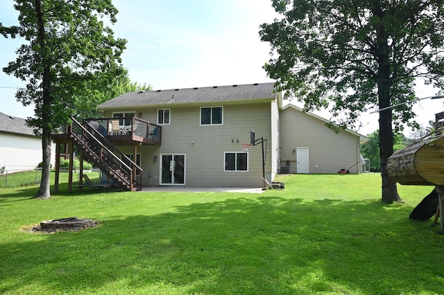 11764 35th Ave SE, Becker, MN 55308 - rear view of property with an outdoor fire pit, a deck, stairs, a yard, and a patio area