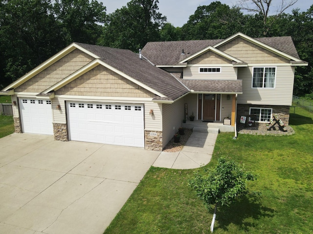 11764 35th Ave SE, Becker, MN 55308 - view of front of house with stone siding, a garage, driveway, and a front lawn