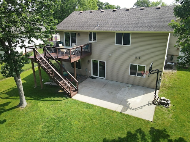 11764 35th Ave SE, Becker, MN 55308 - back of property featuring a wooden deck, a shingled roof, a yard, and a patio area