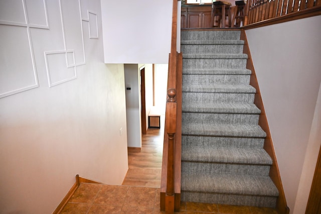 11764 35th Ave SE, Becker, MN 55308 - stairway featuring baseboards and tile patterned flooring