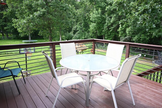 11764 35th Ave SE, Becker, MN 55308 - deck with outdoor dining space and a yard