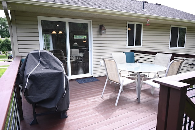 11764 35th Ave SE, Becker, MN 55308 - deck featuring outdoor dining space