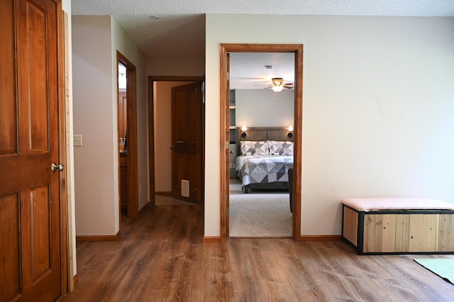 11764 35th Ave SE, Becker, MN 55308 - hallway with wood finished floors and baseboards