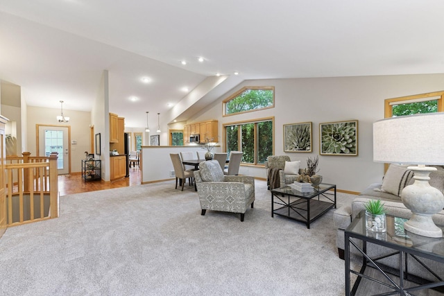 1614 Maple Manors Ct, Mound, MN 55364 - living room featuring light carpet, plenty of natural light, and vaulted ceiling