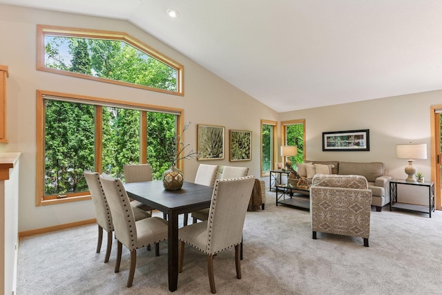 1614 Maple Manors Ct, Mound, MN 55364 - dining space featuring light carpet and high vaulted ceiling