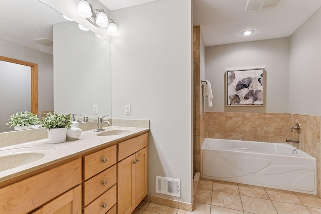1614 Maple Manors Ct, Mound, MN 55364 - full bath with tile patterned flooring, double vanity, a garden tub, and a shower with door
