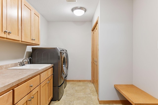 1614 Maple Manors Ct, Mound, MN 55364 - laundry room featuring cabinet space and independent washer and dryer