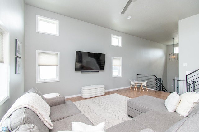 5252 8th Ct W, West Fargo, ND 58078 - living room with healthy amount of natural light, a ceiling fan, and wood finished floors
