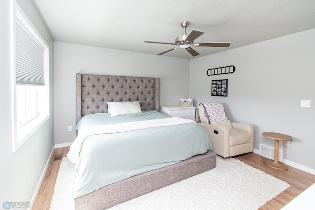 5252 8th Ct W, West Fargo, ND 58078 - bedroom featuring wood finished floors and a ceiling fan