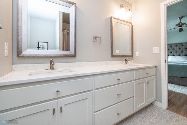 5252 8th Ct W, West Fargo, ND 58078 - ensuite bathroom featuring double vanity and a ceiling fan