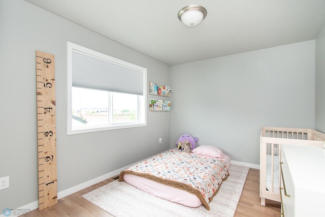 5252 8th Ct W, West Fargo, ND 58078 - bedroom with light wood-style flooring