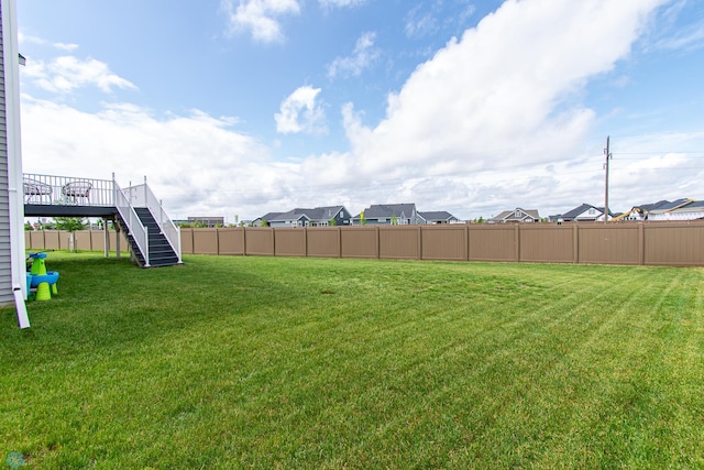 5252 8th Ct W, West Fargo, ND 58078 - fenced backyard with stairway