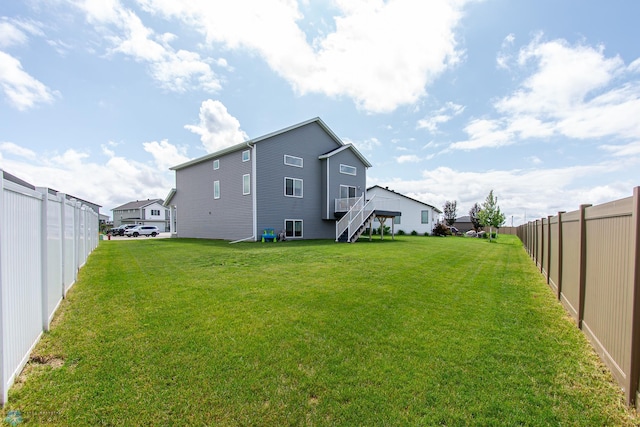 5252 8th Ct W, West Fargo, ND 58078 - rear view of house featuring stairway