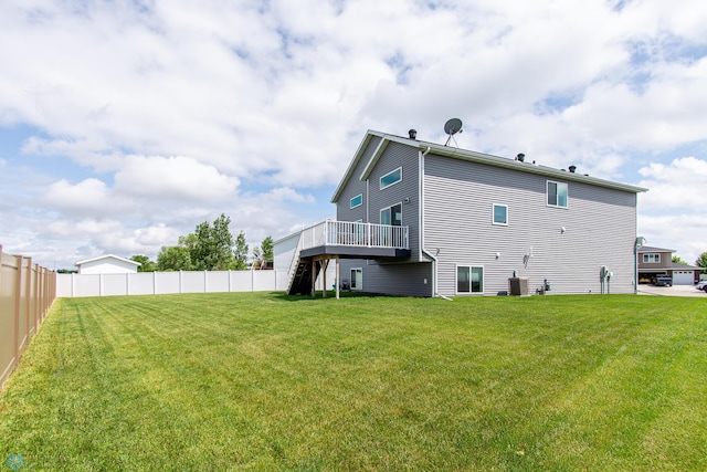 5252 8th Ct W, West Fargo, ND 58078 - rear view of house featuring a wooden deck