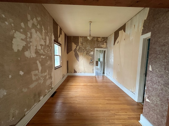 613 Cedar St, Luverne, MN 56156 - unfurnished dining area with wood-type flooring