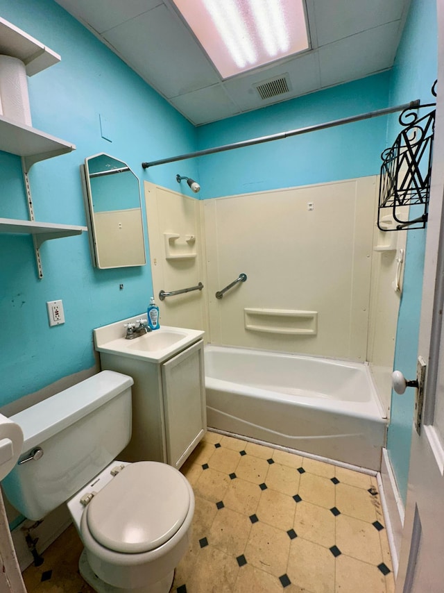 613 Cedar St, Luverne, MN 56156 - bathroom featuring  shower combination, vanity, and a drop ceiling