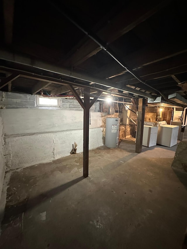 613 Cedar St, Luverne, MN 56156 - unfinished below grade area featuring water heater and independent washer and dryer